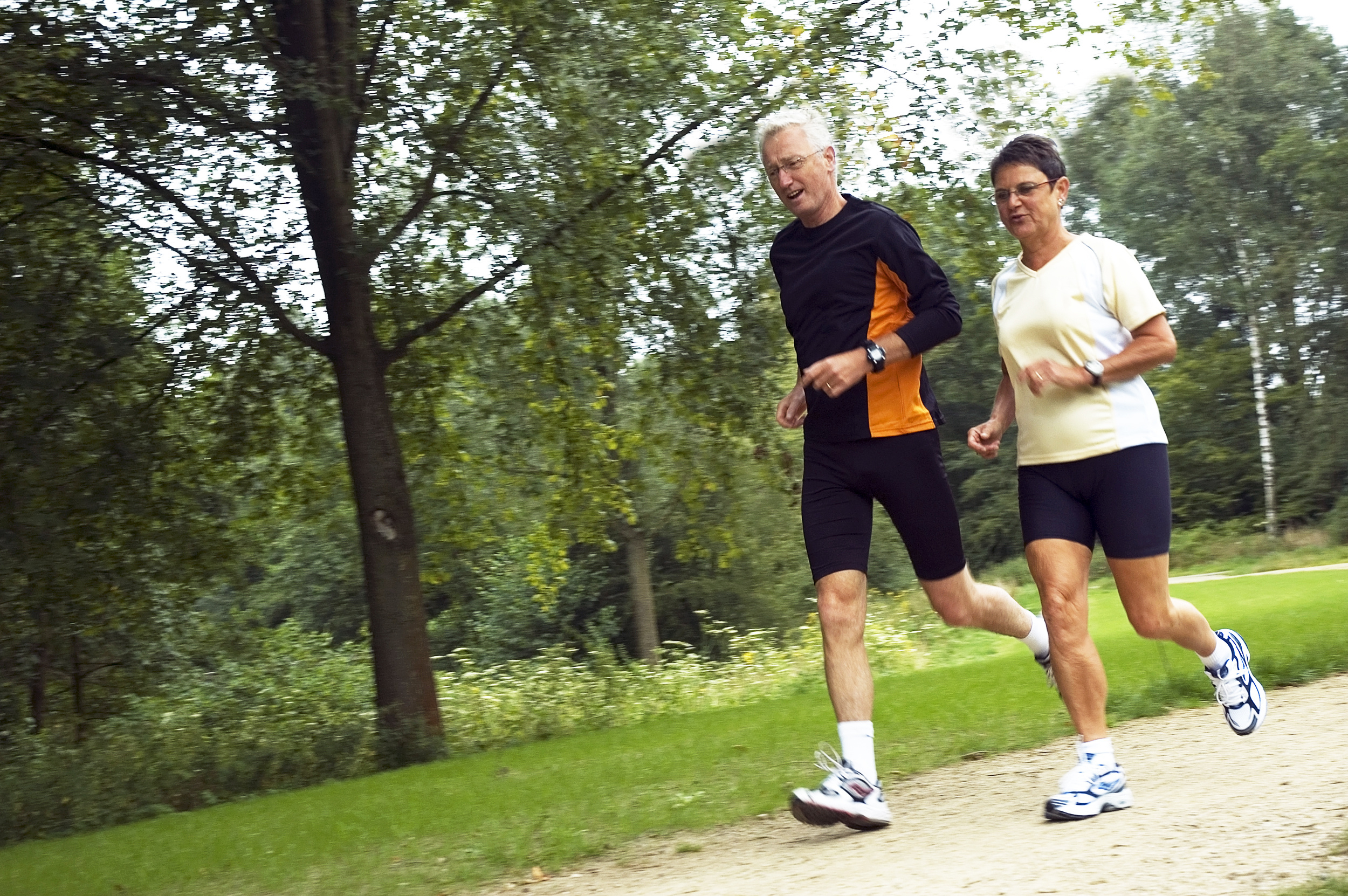 senior couple running